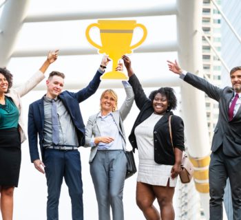 sales team trophy celebrating